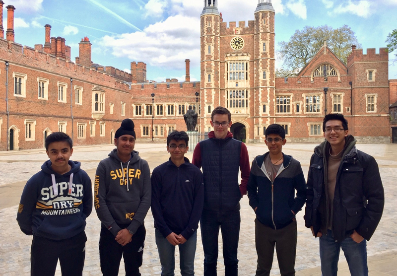 a picture of the chess team standing outside
