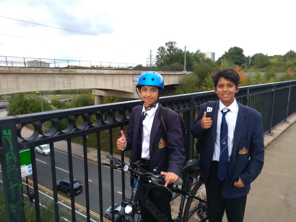 two students on a bridge
