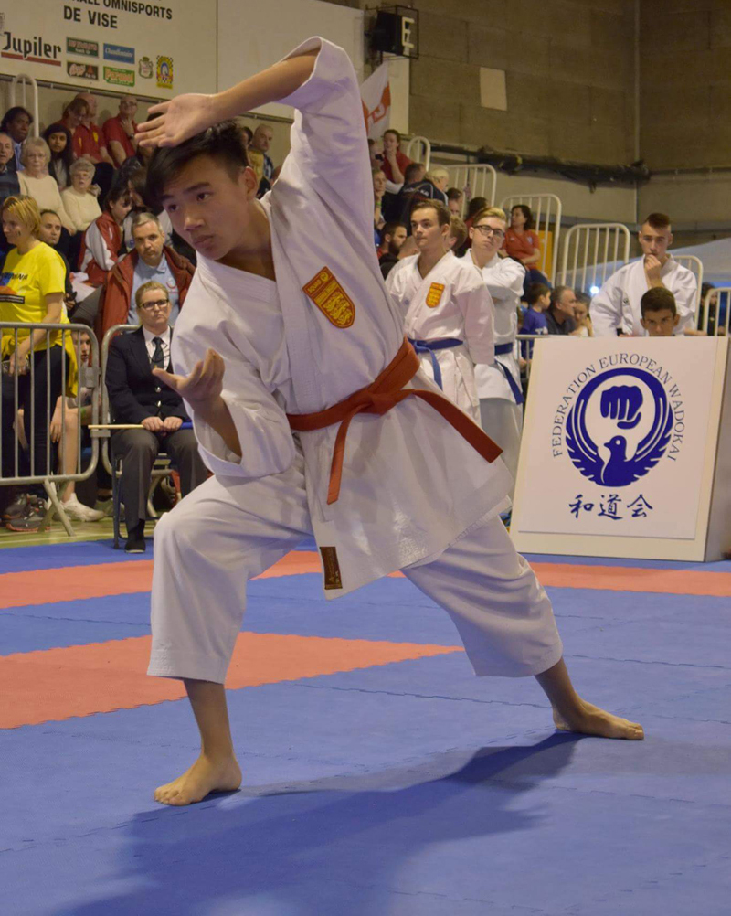 a picture of a student on the martial arts mat
