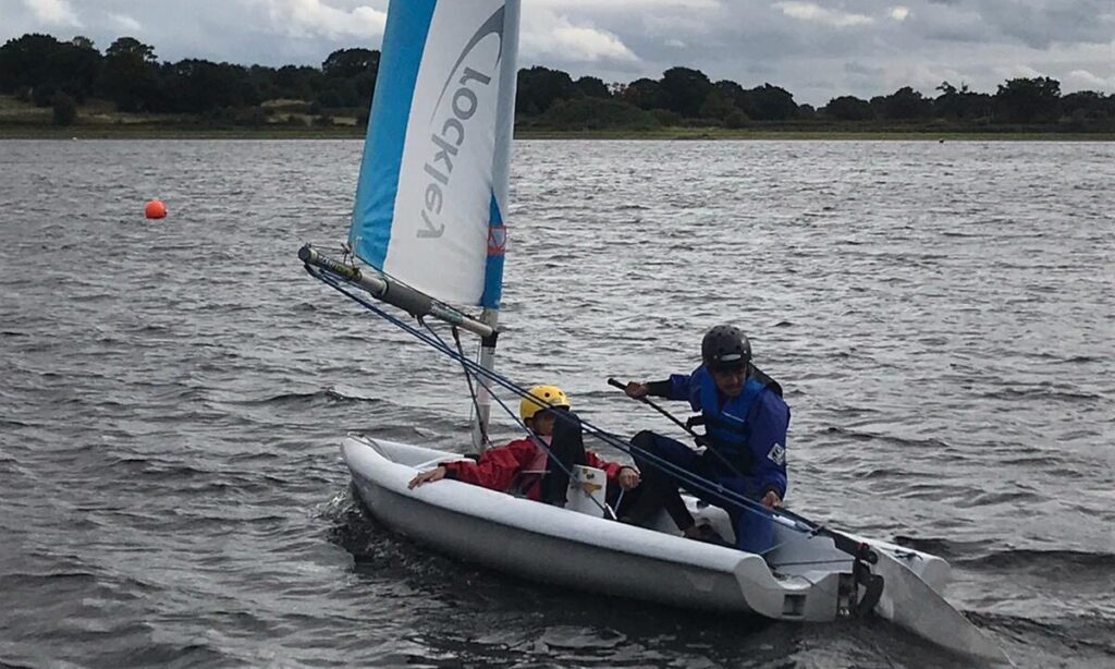 a picture of students sailing