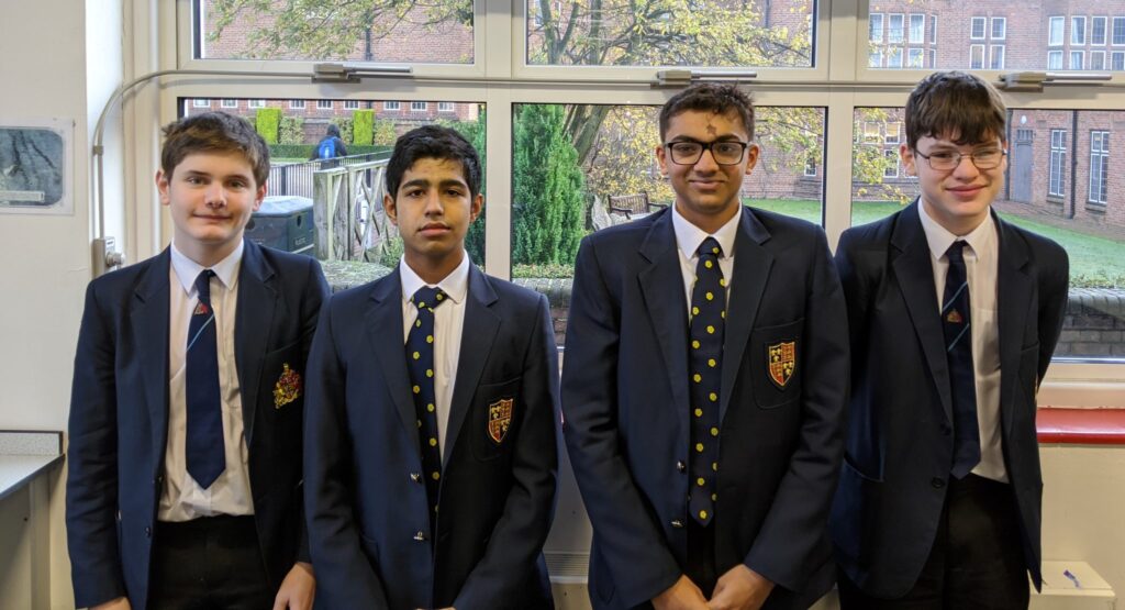 a picture of four students who went to the national final