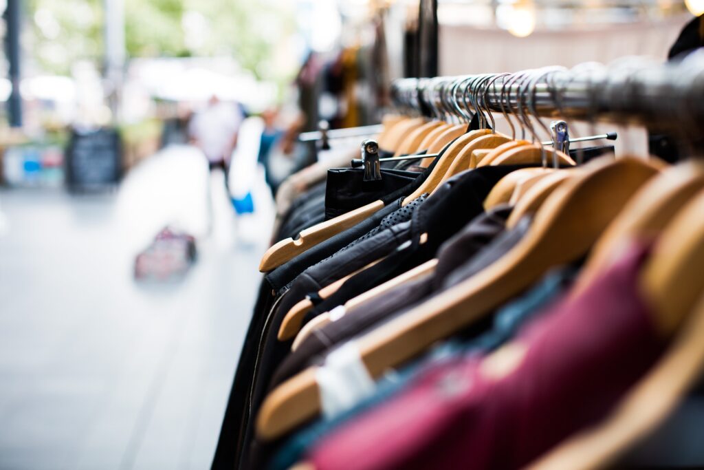 a picture of a bunch of clothes on a coat hanger