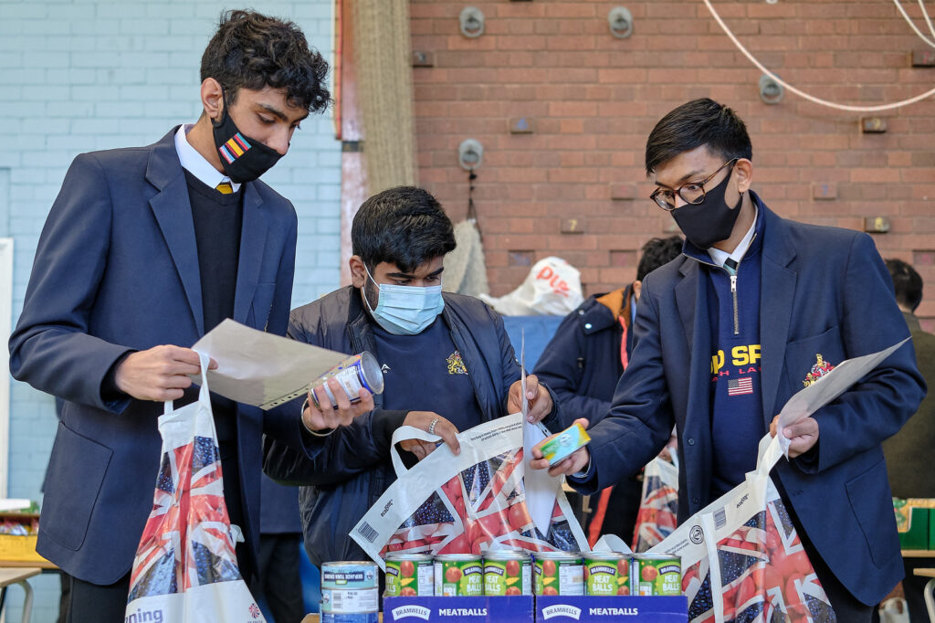 Pupils in the Divisions (Year 12) at King Edwards School, Birmingham take time out of their lunch hour on Friday 27 November 2020 to run a foodbank for local families.