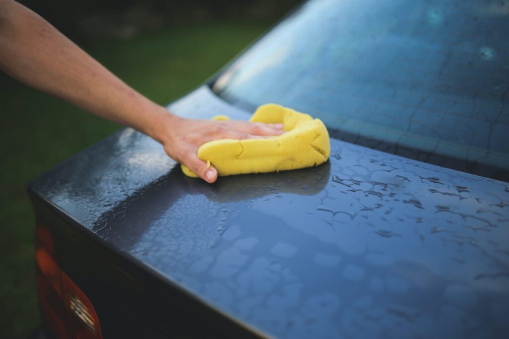 a picture of someone washing their car