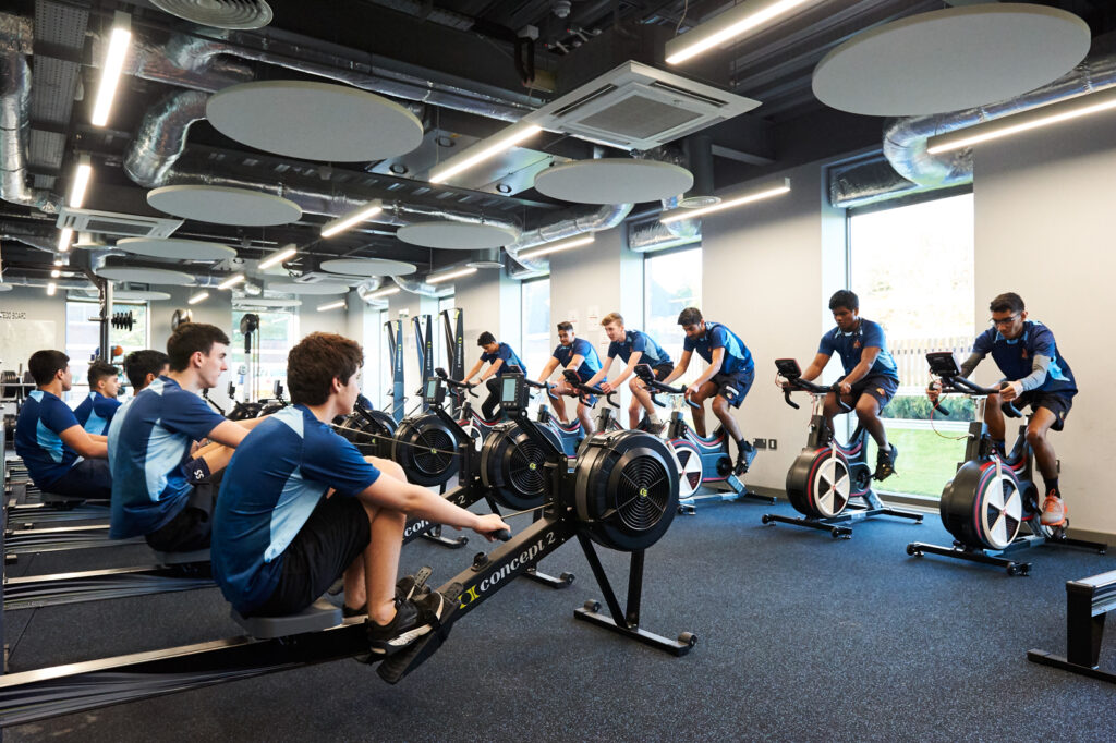 students doing exercise in the gym