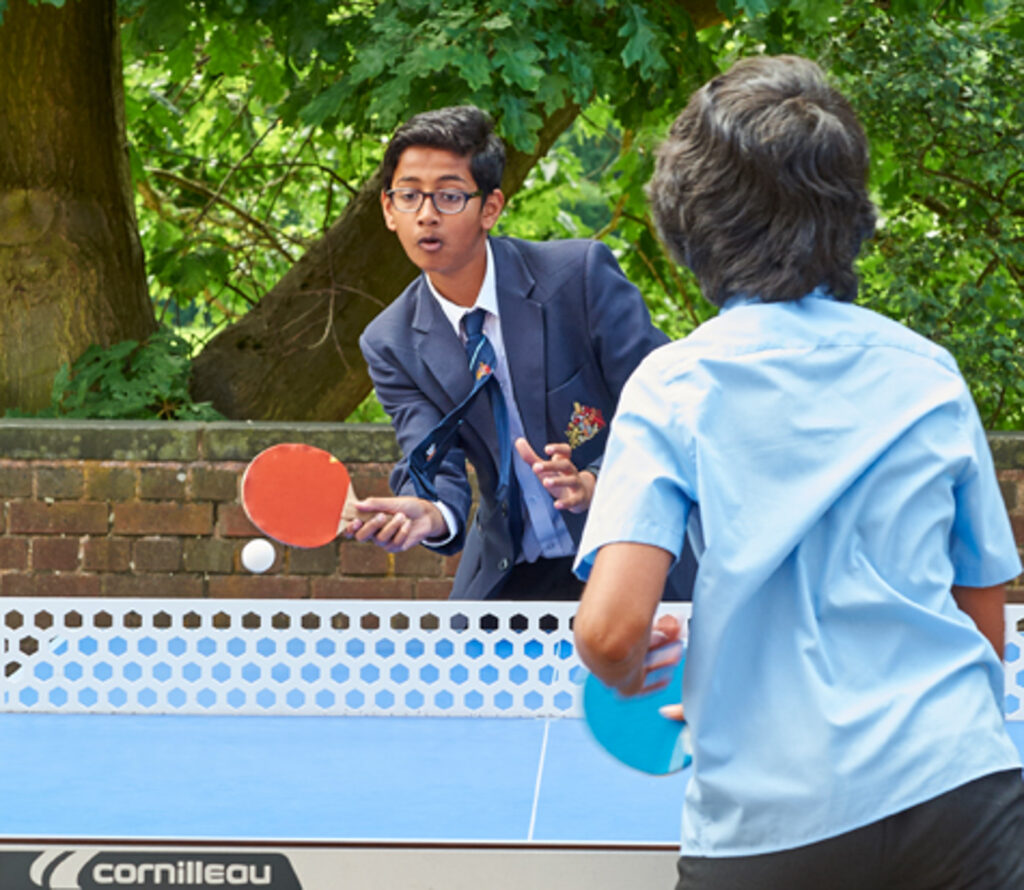 a picture of students playing table tennis